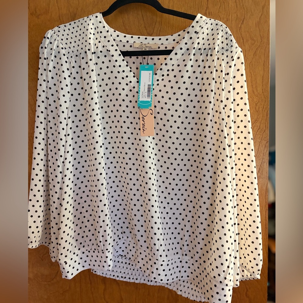 Chic Polka Dot Blouse in Black and White